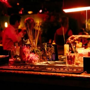 a bar with a bunch of bottles and glasses on it